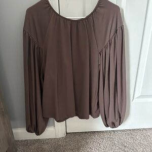 Mauve colored loose sleeve blouse